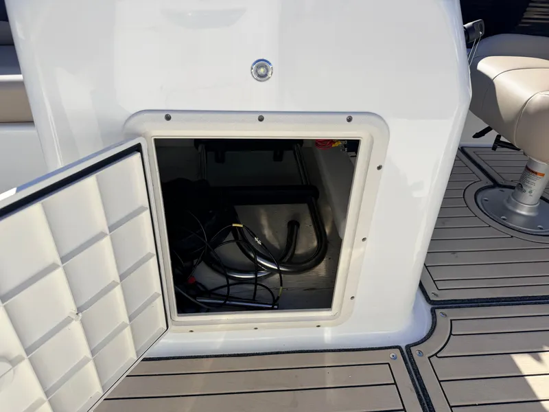Slide: The Image of Hurricane Fun Deck 198 storage compartment with open hatch, 2021 model. - 28
