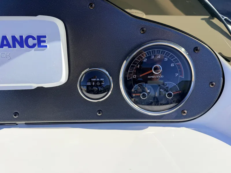 Slide: The Image of Dashboard of Hurricane Fun Deck 198 boat, tachometer and gauges. - 32
