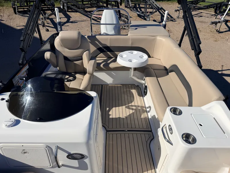 Slide: The Image of Interior of a 2021 Hurricane Fun Deck 198 boat with seating area. - 5