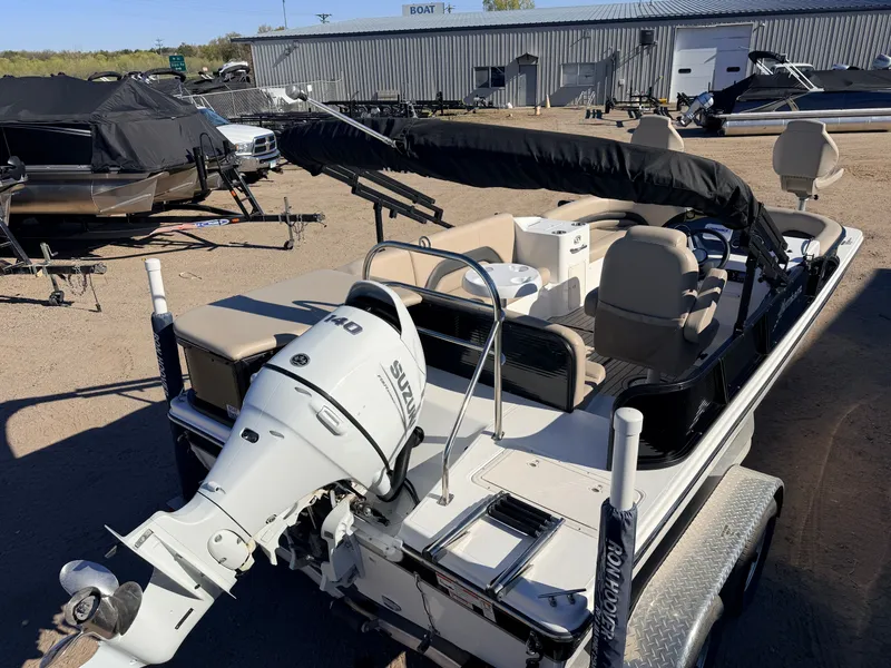 Slide: The Image of 2021 Hurricane Fun Deck 198 boat with Suzuki engine and trailer. - 7