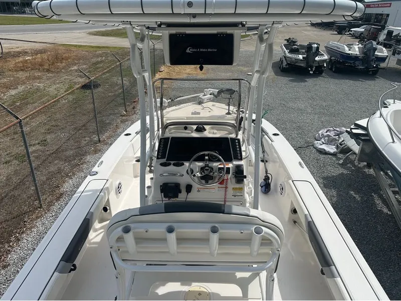 Slide: The Image of 2023 Robalo 226 Caymen boat cockpit view outdoors. - 12