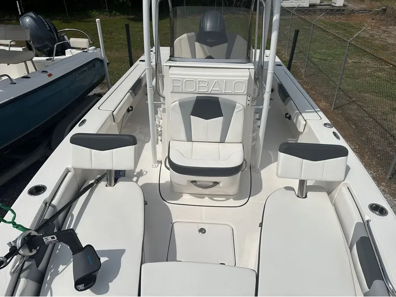 Slide: The Image of 2023 Robalo 226 Caymen boat interior with seating arrangement. - 20