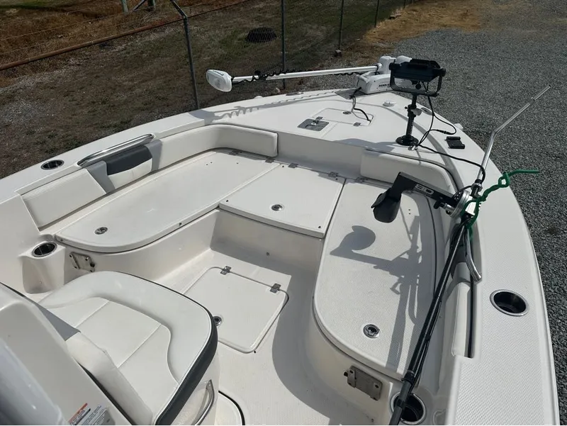 Slide: The Image of 2023 Robalo 226 Caymen boat deck with fishing rod holder. - 3