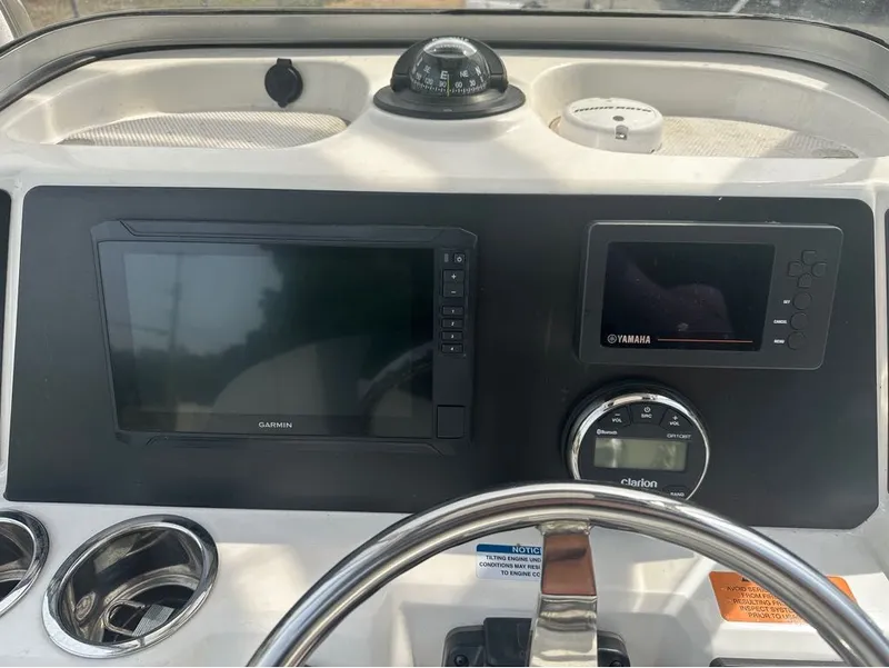 Slide: The Image of Dashboard of 2023 Robalo 226 Caymen with Garmin and Yamaha devices. - 8