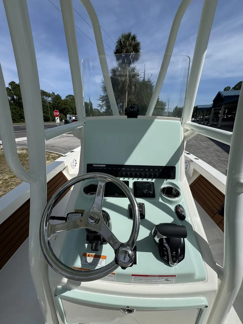 Slide: The Image of Control console of the 2026 Pathfinder 2500 Hybrid boat. - 12