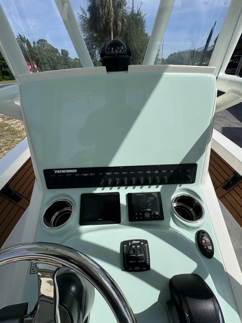 Slide: The Image of Pathfinder 2500 Hybrid 2026 helm with modern controls and displays. - 14