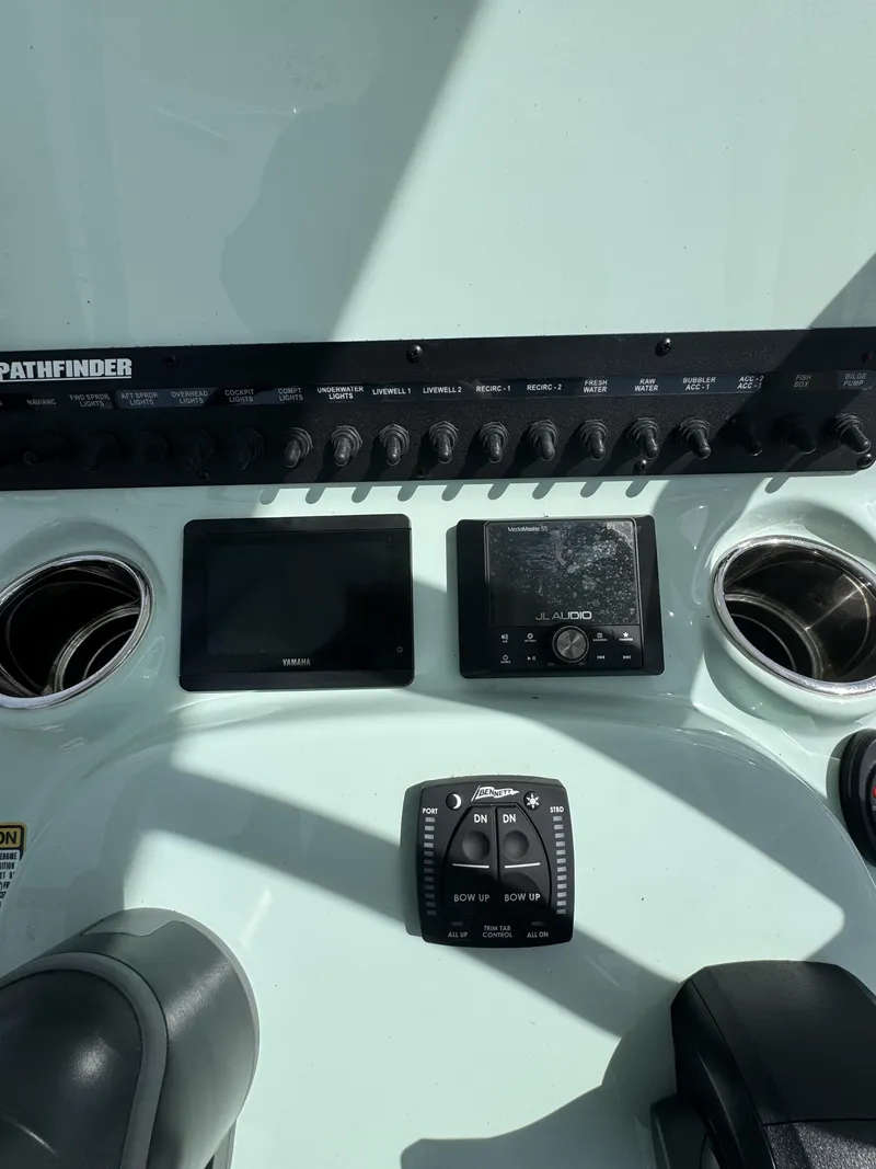 Slide: The Image of Dashboard of Pathfinder 2500 Hybrid 2026 with controls and displays. - 16