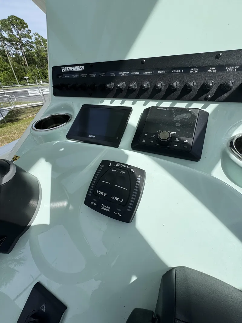 Slide: The Image of Dashboard of 2026 Pathfinder 2500 Hybrid with controls and displays. - 18