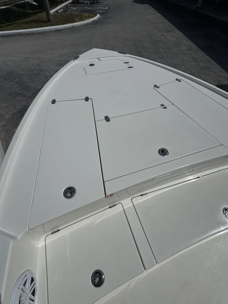 Slide: The Image of Deck of 2026 Pathfinder 2500 Hybrid with storage hatches. - 19