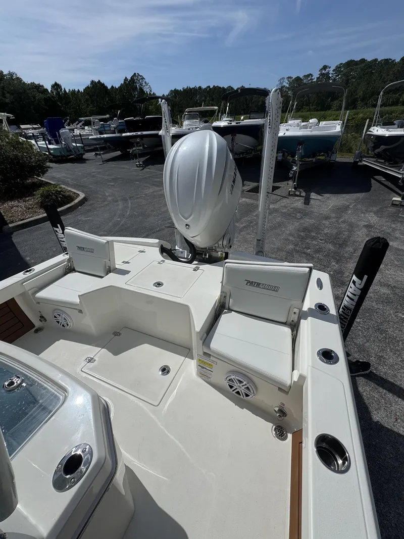 Slide: The Image of Pathfinder 2500 Hybrid boat, 2026 model, parked in a lot. - 24