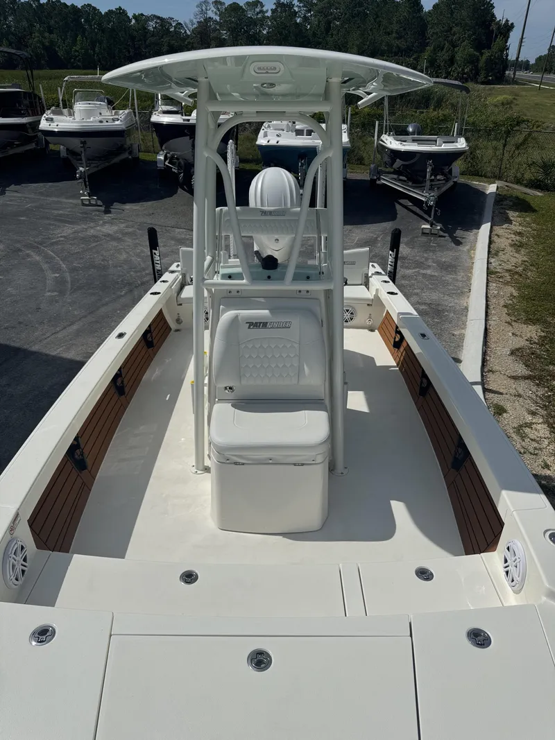 Slide: The Image of Pathfinder 2500 Hybrid boat, 2026 model, parked outdoors. - 25