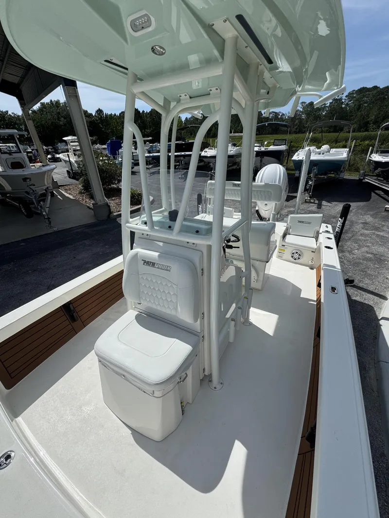 Slide: The Image of Pathfinder 2500 Hybrid 2026, modern boat canopy and seating area. - 27