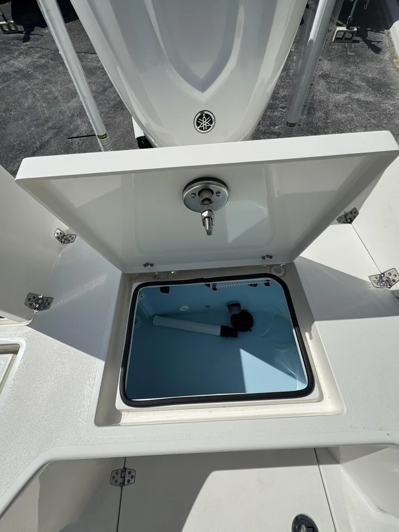 Slide: The Image of Pathfinder 2500 Hybrid 2026 with open storage compartment lid. - 32