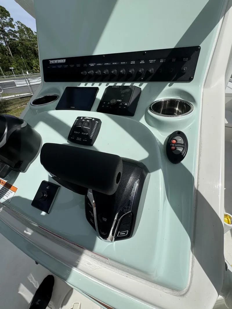 Slide: The Image of Control console of 2026 Pathfinder 2500 Hybrid with controls. - 38