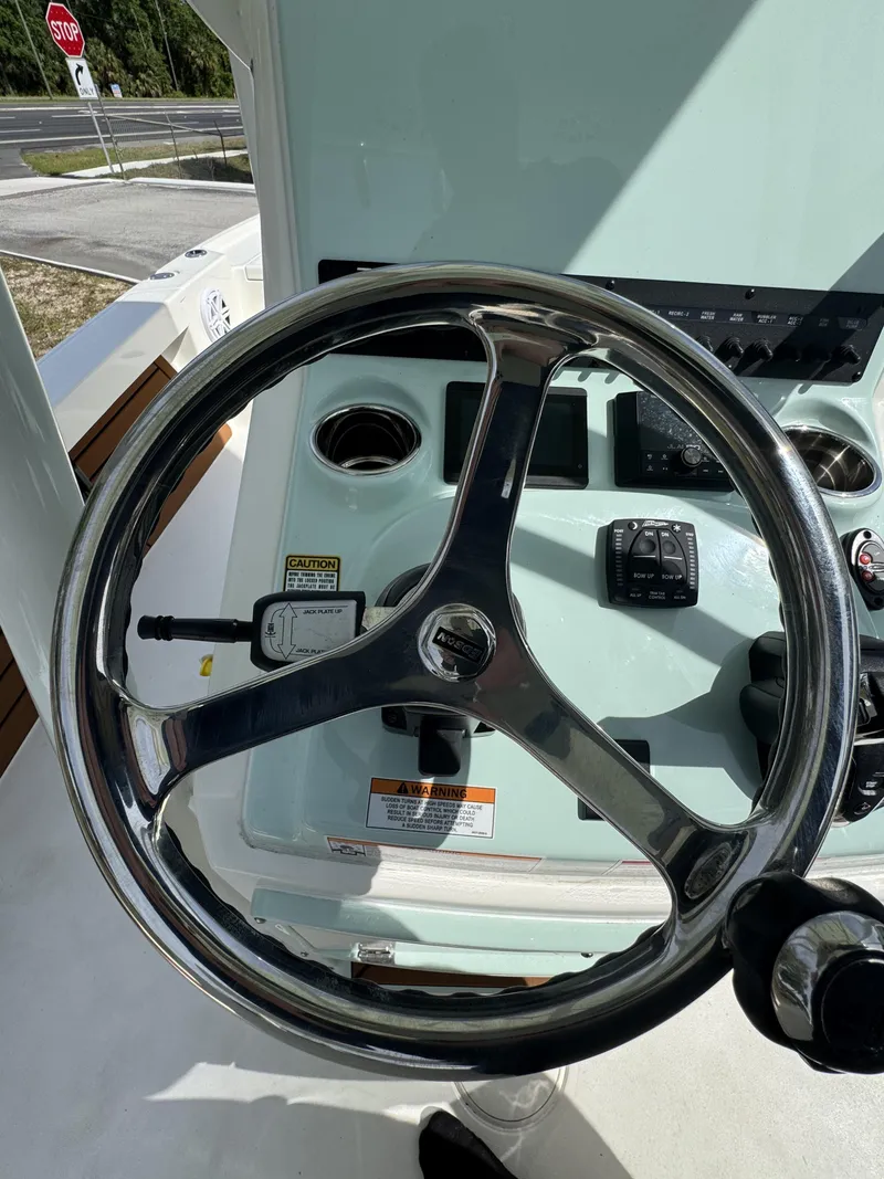 Slide: The Image of Pathfinder 2500 Hybrid 2026 steering console with shiny wheel. - 39