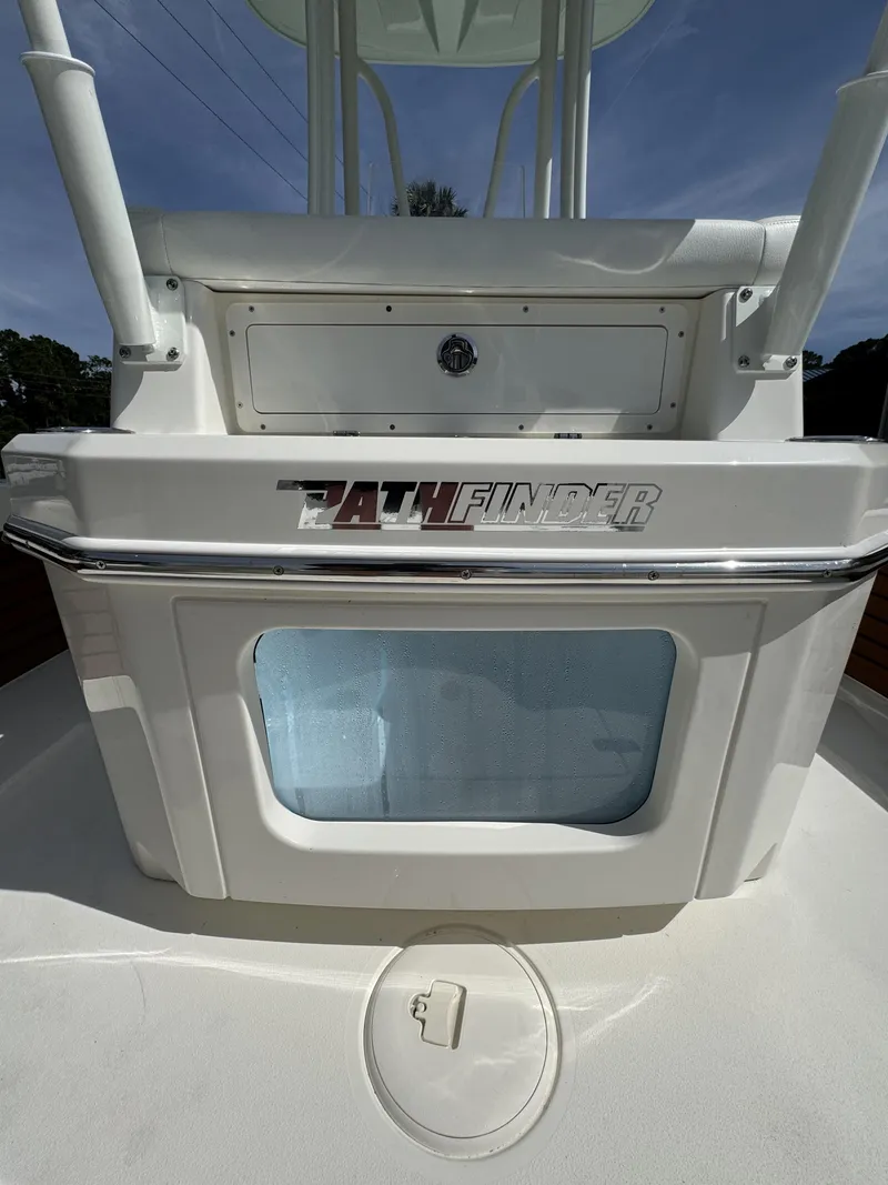 Slide: The Image of Pathfinder 2500 Hybrid boat, 2026 model, featuring storage and logo. - 44