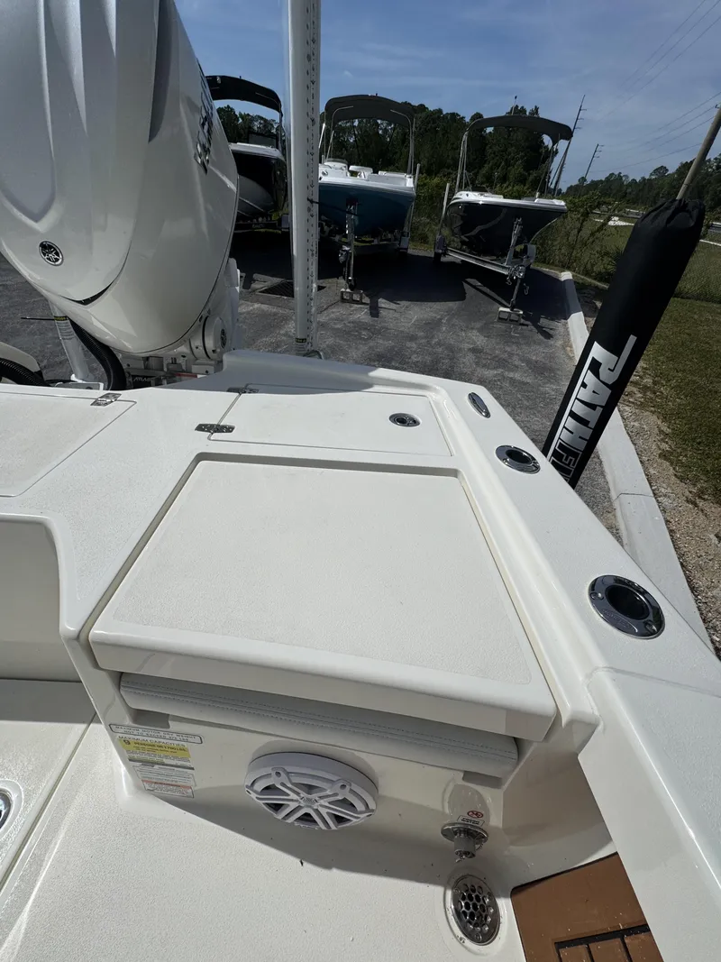 Slide: The Image of Pathfinder 2500 Hybrid 2026 boat with outboard motor. - 45