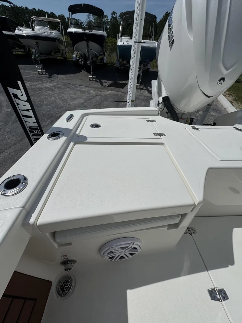 Slide: The Image of Pathfinder 2500 Hybrid 2026 boat with motor and deck view. - 46
