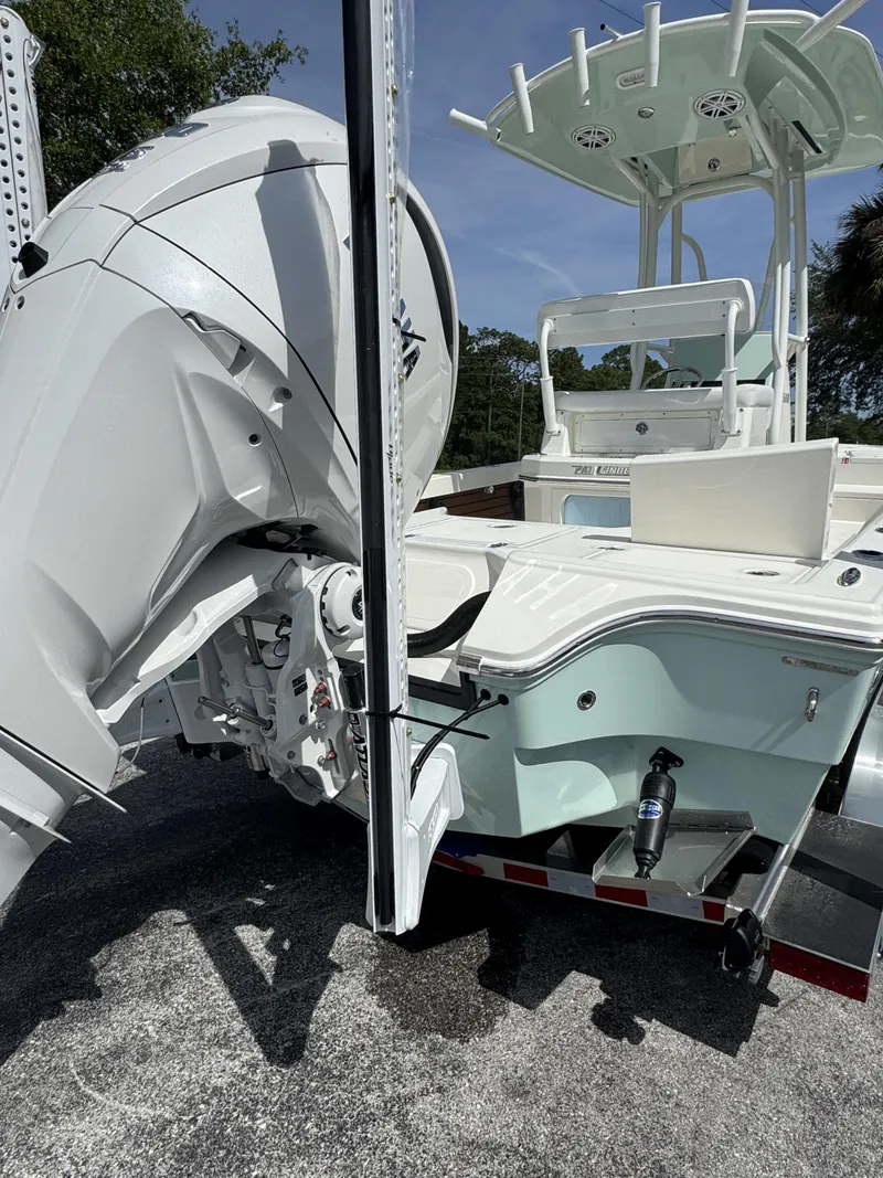 Slide: The Image of Pathfinder 2500 Hybrid boat 2026 with outboard motor. - 5