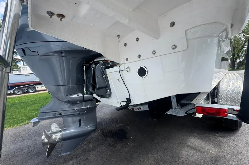 Slide: The Image of 2023 Jeanneau NC Sport 695 Series 2 boat engine and trailer detail. - 15