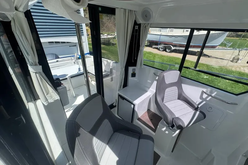 Slide: The Image of Interior of 2023 Jeanneau NC Sport 695 Series 2 boat with modern seating. - 29