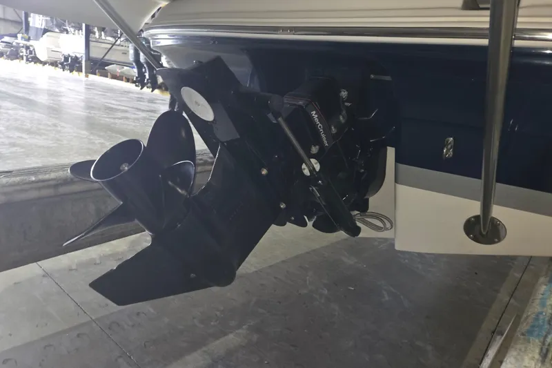 Slide: The Image of 2014 Four Winns 190 Horizon boat with MerCruiser outdrive in a storage facility. - 8