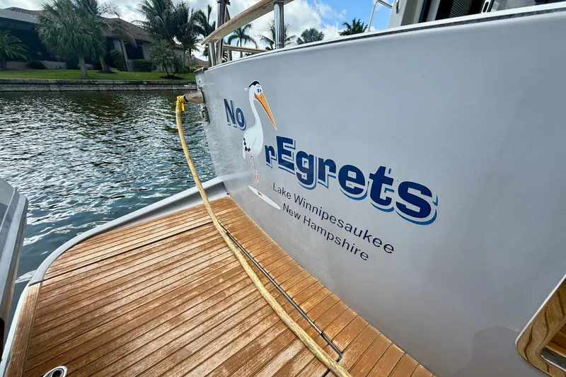 Slide: The Image of Beneteau Swift Trawler 44, 2020, docked with "No Regrets" name, Lake Winnipesaukee. - 31