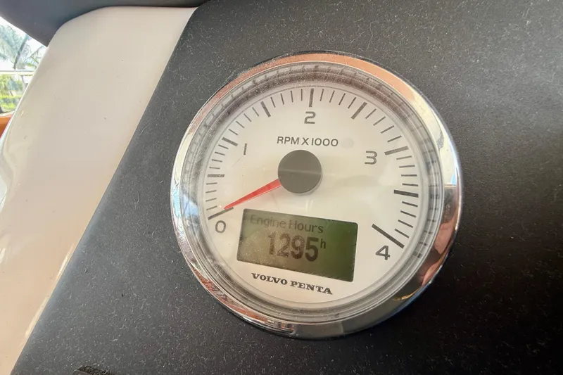 Slide: The Image of Volvo Penta tachometer showing 1295 engine hours on Beneteau Swift Trawler 44, 2020 model. - 37