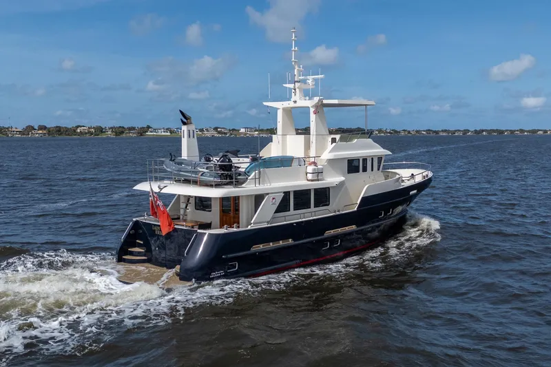 Slide: The Image of Alm Trawler Delfino 64 yacht cruising on open water, 2022 model by Jachtbouw De Alm. - 11
