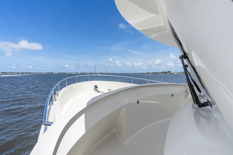 Slide: The Image of Alm Trawler Delfino 64 yacht cruising on a sunny day, 2022 model. - 26