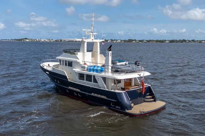 Slide: The Image of 2022 Alm Trawler Delfino 64 by Jachtbouw De Alm cruising on open water. - 6