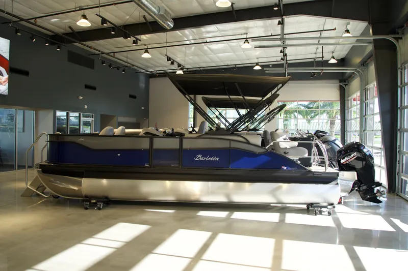 The Image of 2026 Barletta Aria 22F pontoon boat in showroom. - 1