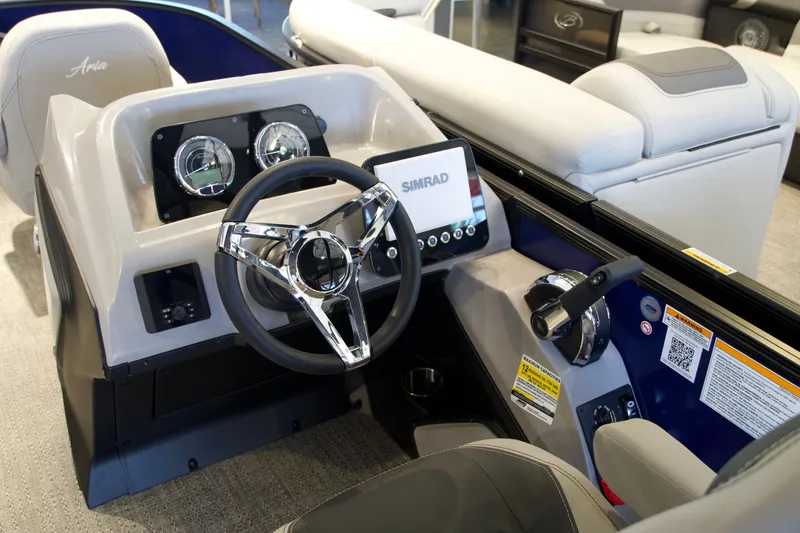 Slide: The Image of Interior view of Barletta Aria 22F 2026 helm with Simrad display. - 9