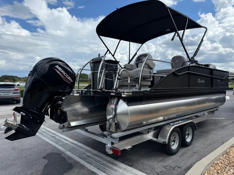 Slide: The Image of 2026 Barletta Aria 22F pontoon boat with Mercury outboard motor. - 5