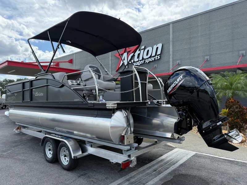 Slide: The Image of 2026 Barletta Aria 22F pontoon boat with Mercury engine on trailer. - 7