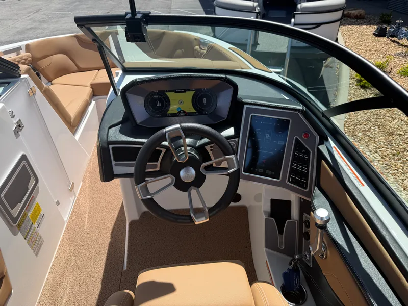 Slide: The Image of Interior of 2022 MasterCraft XT22 with modern dashboard. - 12