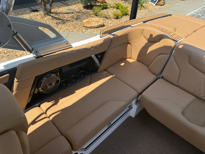 Slide: The Image of Interior of 2022 MasterCraft XT22 with beige leather seating. - 15