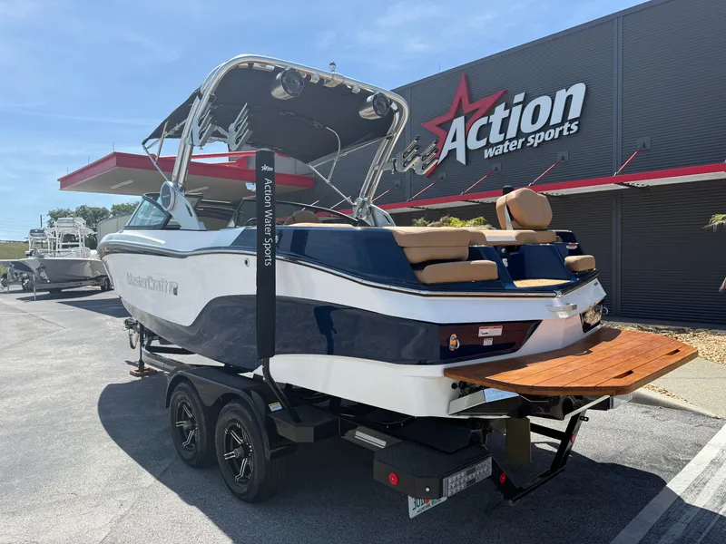 Slide: The Image of 2022 MasterCraft XT22 boat at Action Water Sports. - 7