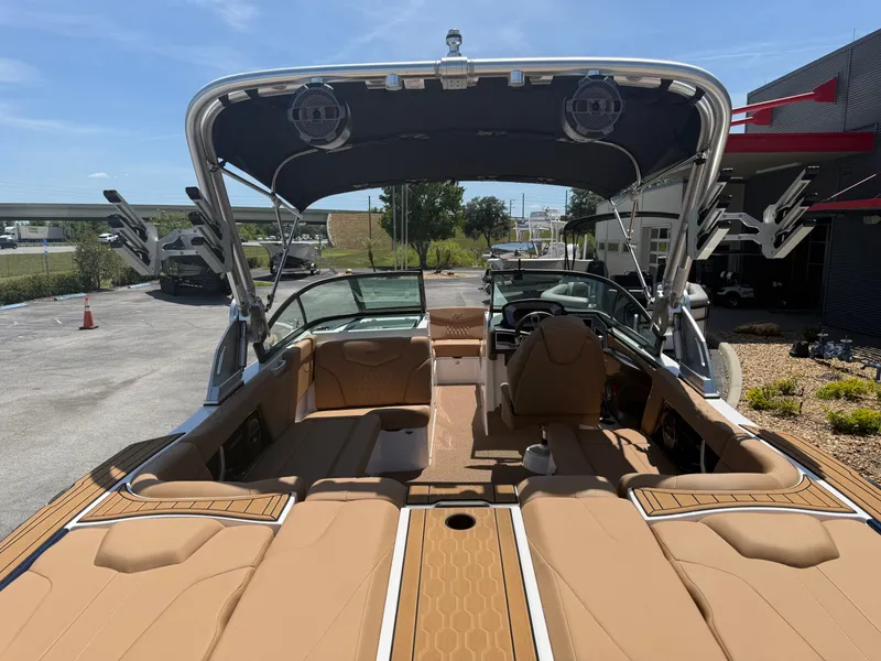 Slide: The Image of Interior of a 2022 MasterCraft XT22 boat with luxurious seating. - 8