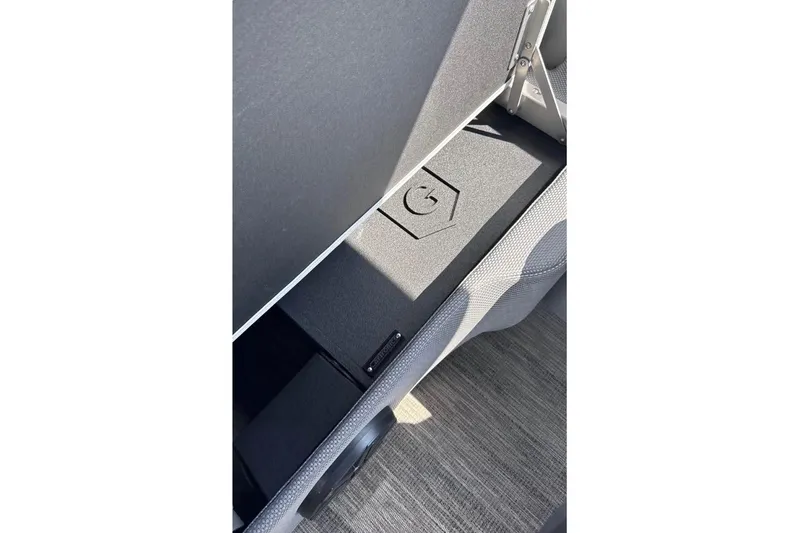 Slide: The Image of Storage compartment in 2023 Godfrey Sweetwater 2486 SFL boat, featuring sleek design and durable materials. - 10