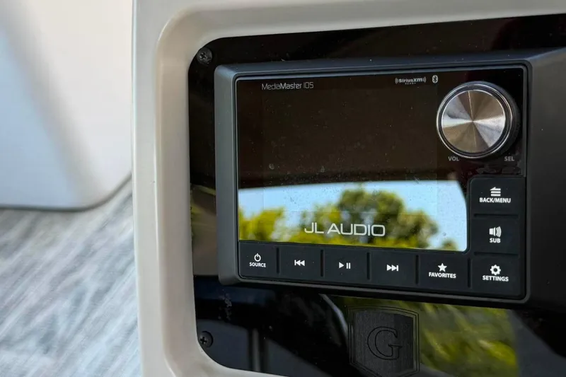 Slide: The Image of Close-up of JL Audio system in 2023 Godfrey Sweetwater 2486 SFL boat. - 19