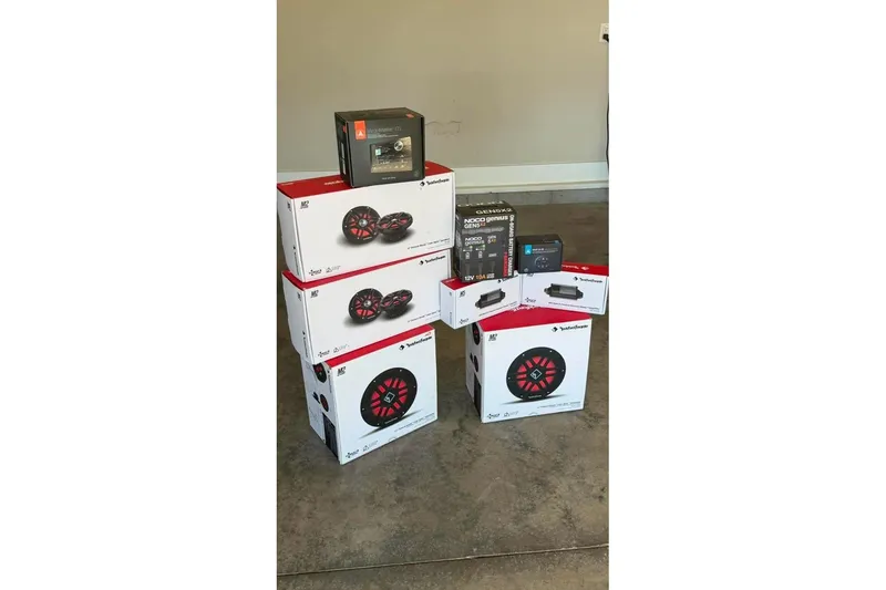 Slide: The Image of Boxes of audio equipment and accessories for Godfrey Sweetwater 2486 SFL 2023 model. - 20