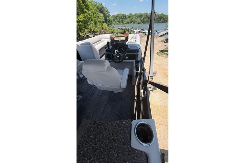 Slide: The Image of Storage compartment in 2023 Godfrey Sweetwater 2486 SFL boat, featuring sleek design and durable materials. - 22