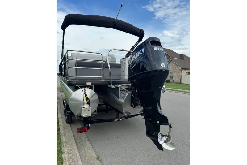 Slide: The Image of 2023 Godfrey Sweetwater 2486 SFL pontoon boat with Suzuki 200 outboard motor on trailer. - 3