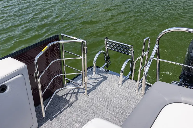 Slide: The Image of Manufacturer Provided Image: 2023 Godfrey SWEETWATER 2486 SFL boat with stainless steel swim ladder and safety gate. - 9