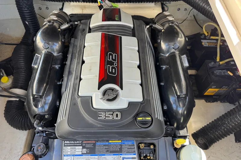 Slide: The Image of 2021 Chaparral 287 SSX boat engine, featuring a powerful 6.2L Mercury 350 motor. - 13