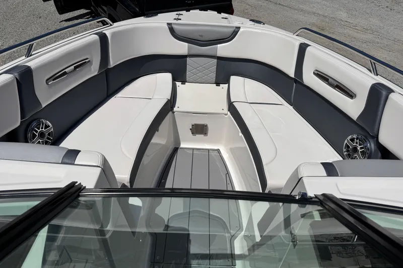 Slide: The Image of 2021 Chaparral 287 SSX boat interior with spacious seating and modern design. - 6