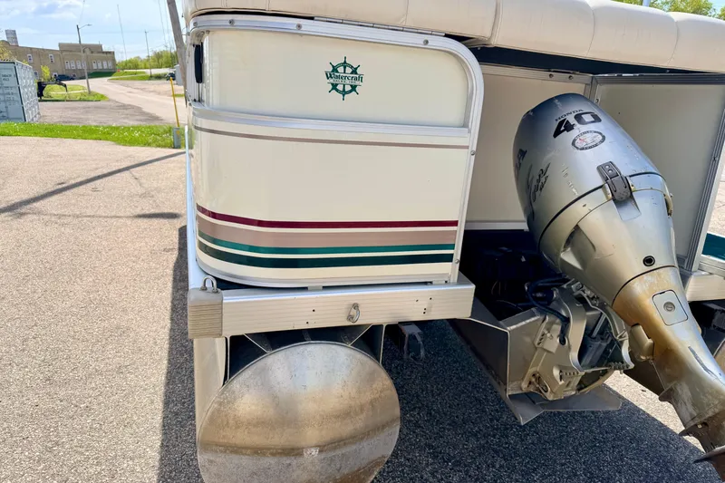 Slide: The Image of Rear view of a 2001 Bennington 2050 LX pontoon boat with Honda 40 outboard motor. - 20