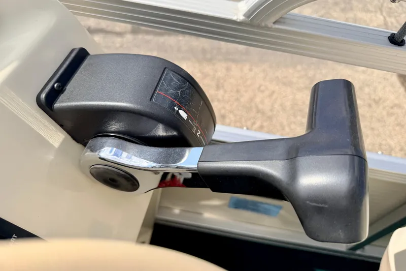 Slide: The Image of Close-up of a throttle control lever on a 2001 Bennington 2050 LX boat. - 40
