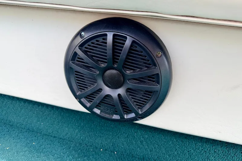 Slide: The Image of Close-up of a speaker on a 2001 Bennington 2050 LX boat interior. - 56